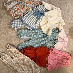 Lot of 12month assorted Rompers and Outfits